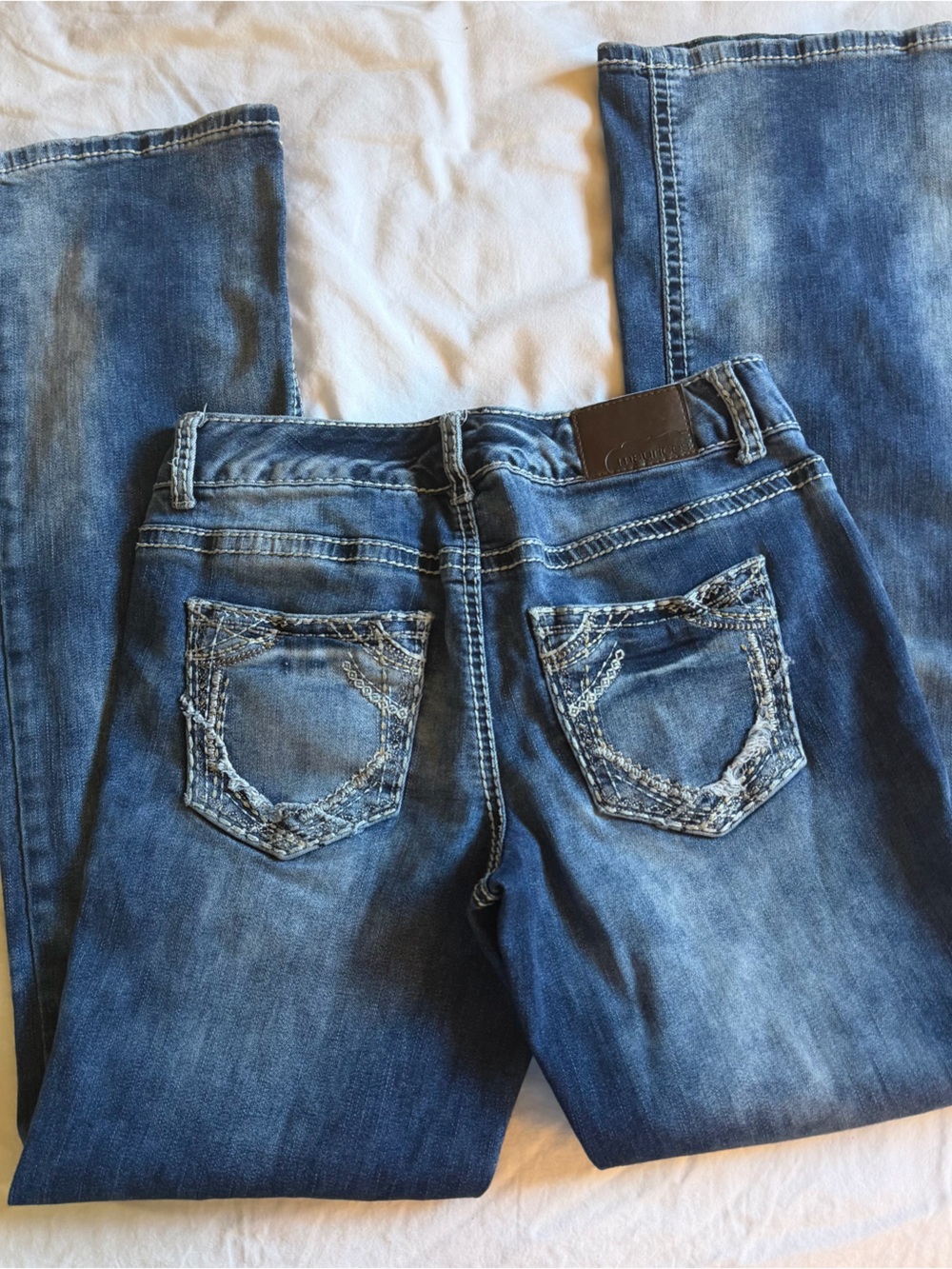 Maurices Medium LowRise Bootcut Jeans with Embroidered Back Pockets